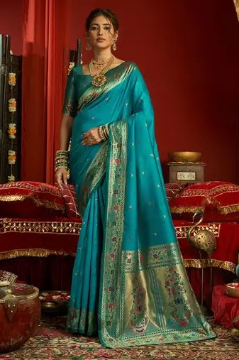 Women aqua blue floral motifs silk blend saree