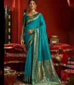 Women aqua blue floral motifs silk blend saree