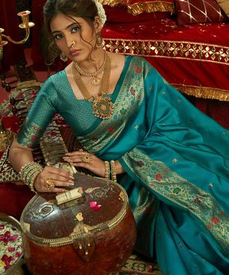 Women aqua blue floral motifs silk blend blend saree 5