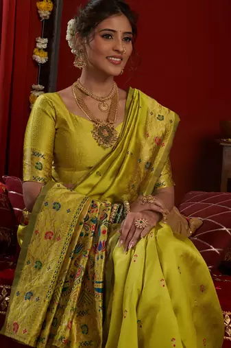 Women lime green floral motifs silk blend saree
