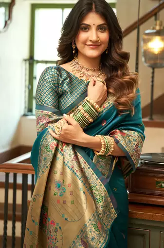 Women dark teal peacock motifs silk blend saree
