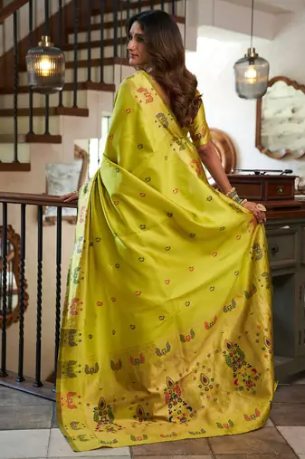 Women lime green peacock motifs silk blend saree