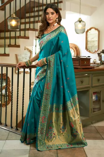 Women teal peacock motifs silk blend saree