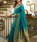 Women teal peacock motifs silk blend saree