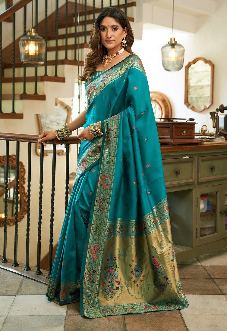 Women teal peacock motifs silk blend saree