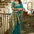 Women teal peacock motifs silk blend saree