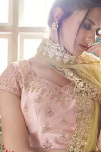 Soft Premium Net Party Wear Lehenga In Peach Color With Embroidery Work & Stone Work