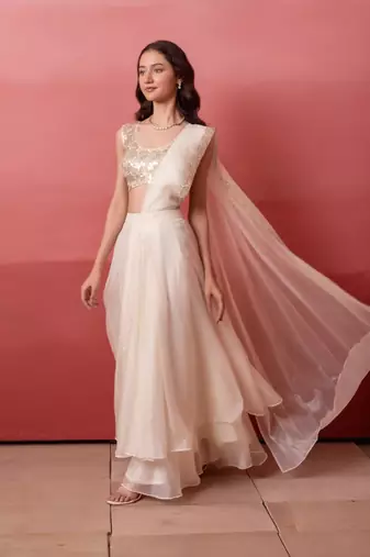 White pre-draped skirt saree with sequin blouse with blouse