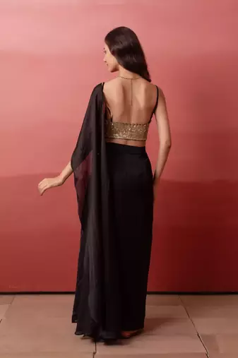 black satin pre-drape slit saree with sequin handwork blouse