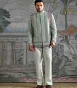 Green embroidered silk bandhgala set