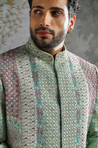 green embroidered silk bandhgala set for men