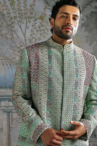 green embroidered silk bandhgala set for men