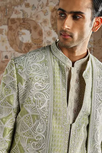 green embroidered raw silk bandhgala set for men