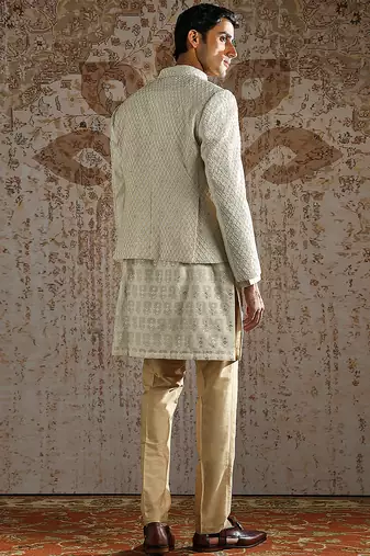 white embroidered silk bandhgala set for men