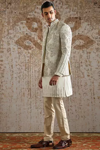 white embroidered raw silk bandhgala set for men