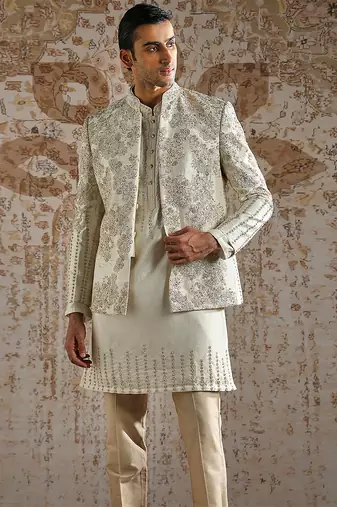 white embroidered raw silk bandhgala set for men