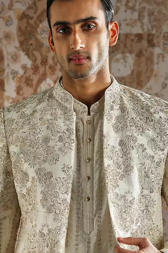 white embroidered raw silk bandhgala set for men