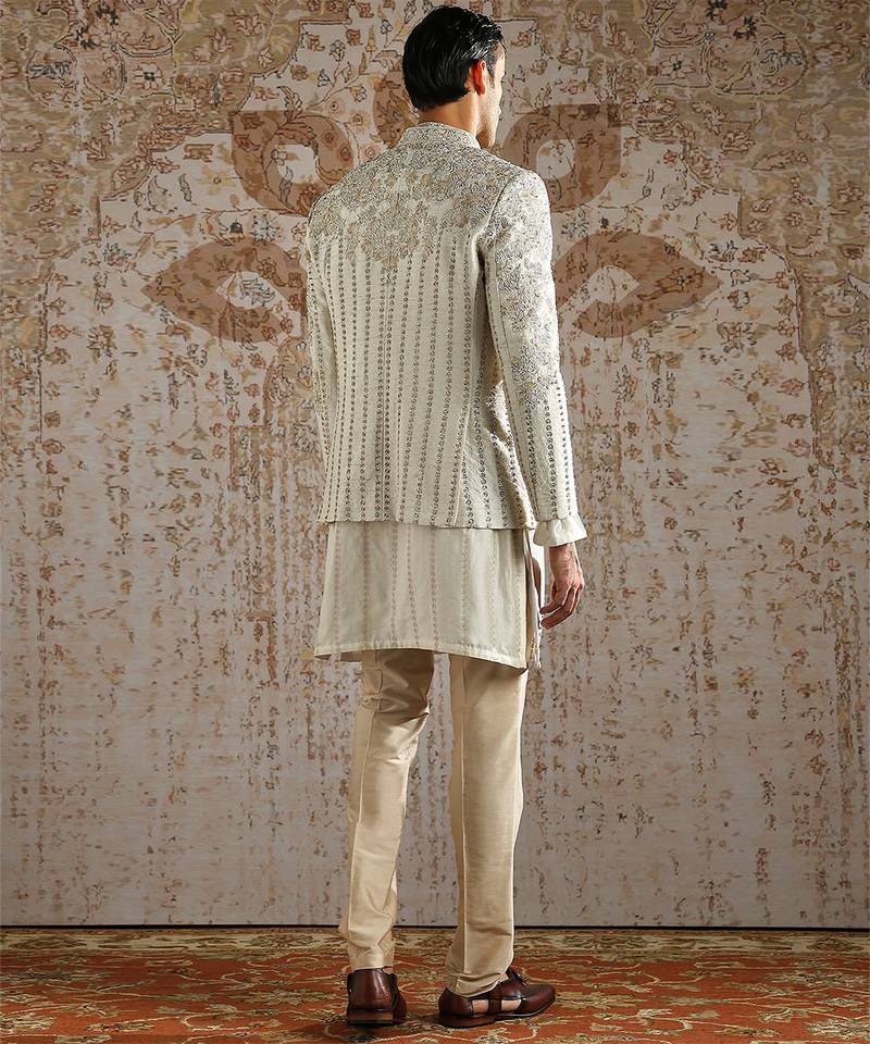 White embroidered raw silk bandhgala set