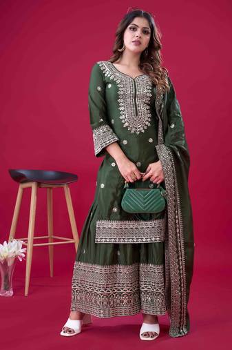 Green festive wear designer trendy elementary designer readymade suit collection