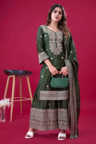Green festive wear designer trendy elementary designer readymade suit collection