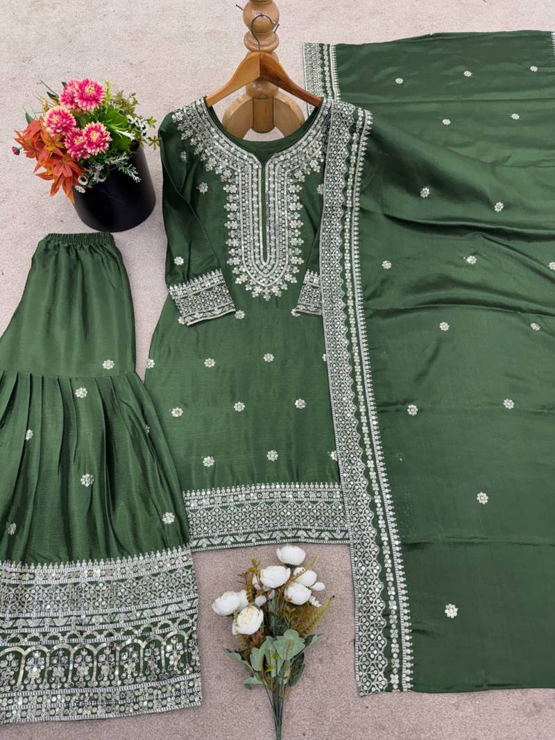 Green festive wear designer trendy elementary designer readymade suit collection