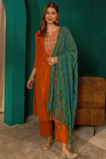 Women's rust silk embroidered straight kurta pant set with dupatta