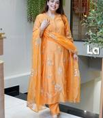 Women's orange embroidered muslin kurta pant set with organza dupatta