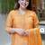 Women's orange embroidered muslin kurta pant set with organza dupatta