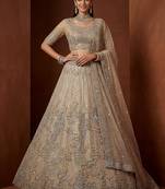 Noteworthy Beige Sequins Net Sangeet Wear Lehenga Choli With Dupatta