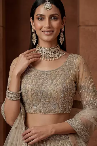 beige sequins net sangeet wear lehenga choli with dupatta