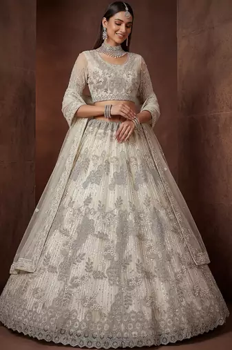 Sparkling Cream Zari Work Net Reception Wear Lehenga Choli With Dupatta