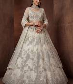 Sparkling Cream Zari Work Net Reception Wear Lehenga Choli With Dupatta