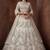 Sparkling Cream Zari Work Net Reception Wear Lehenga Choli With Dupatta