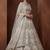 Sparkling Cream Zari Work Net Reception Wear Lehenga Choli With Dupatta