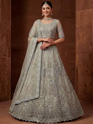 lavish green dori embroidered net wedding wear lehenga choli 1
