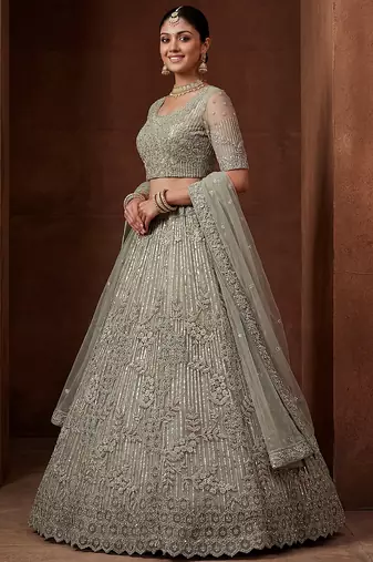 lavish green dori embroidered net wedding wear lehenga choli