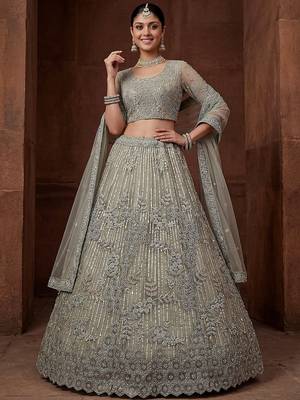 lavish green dori embroidered net wedding wear lehenga choli 3