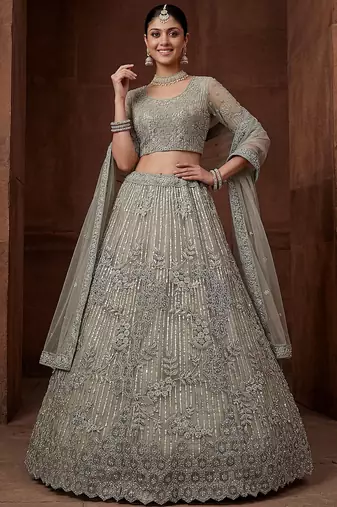 lavish green dori embroidered net wedding wear lehenga choli