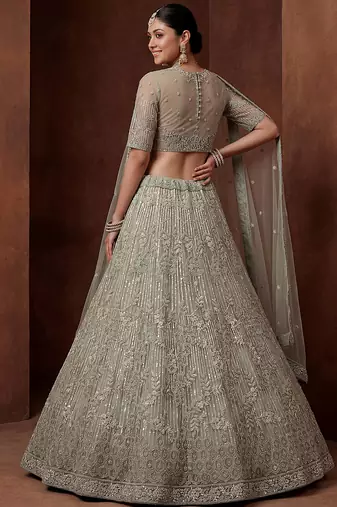 lavish green dori embroidered net wedding wear lehenga choli