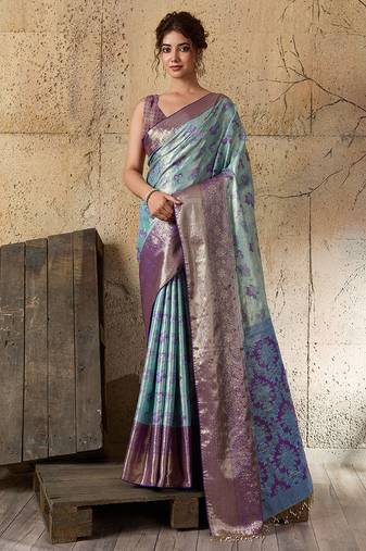 Women's sky blue silk blend saree with rich zari woven design and traditional border with unstiched blouse piece
