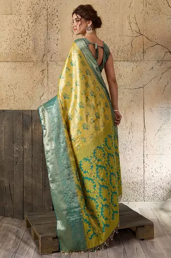lemon yellow silk blend saree with rich zari woven border with blouse piece