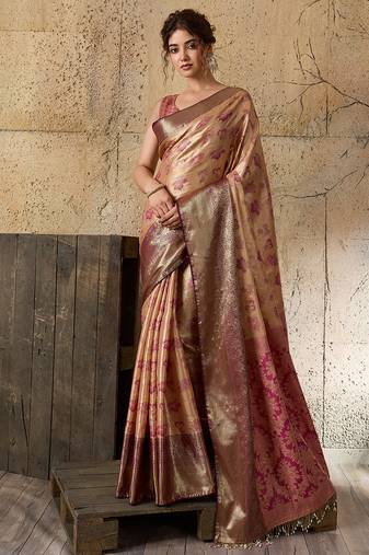 Women's gold silk blend saree with rich zari woven design and traditional border with unstiched blouse piece