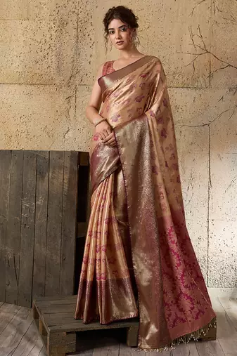 Women's gold silk blend saree with rich zari woven design and traditional border with unstiched blouse piece