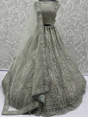 lavish green dori embroidered net wedding wear lehenga choli 6
