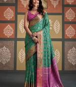 Green patola silk blend party wear saree