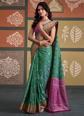 Green patola silk blend party wear saree 2
