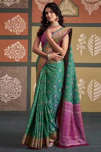 Green patola silk blend party wear saree