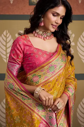 Yellow patola silk blend party wear saree