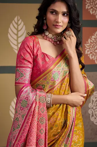Yellow patola silk blend party wear saree