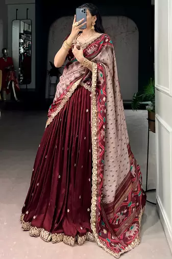 Lovable Maroon Embroidered Silk Wedding Wear Half Saree Lehenga